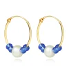 9K Gold hoop earrings – a white freshwater pearl, blue crystals