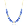 9K Yellow gold necklace – gold beads, blue stones