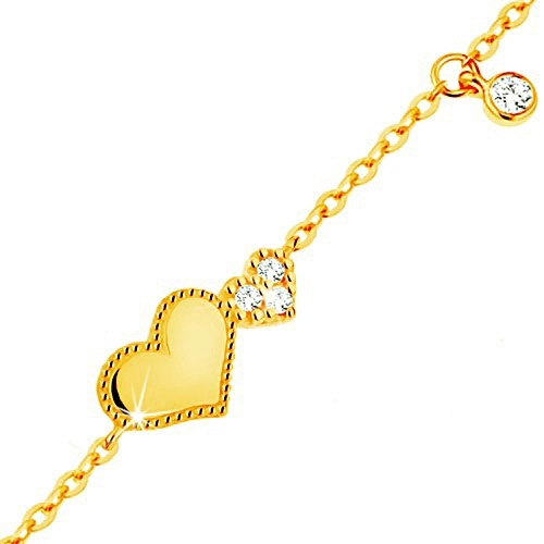 Bracelet made of yellow 14K gold - shiny and glistening heart, dangling clear zircon