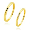 Gold bands in 585 yellow gold - diagonal cut, clear round zircon