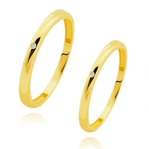 Gold bands in 585 yellow gold - diagonal cut, clear round zircon