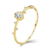 Ring made of yellow 14K gold - clear oval with notched edges, tiny zircons