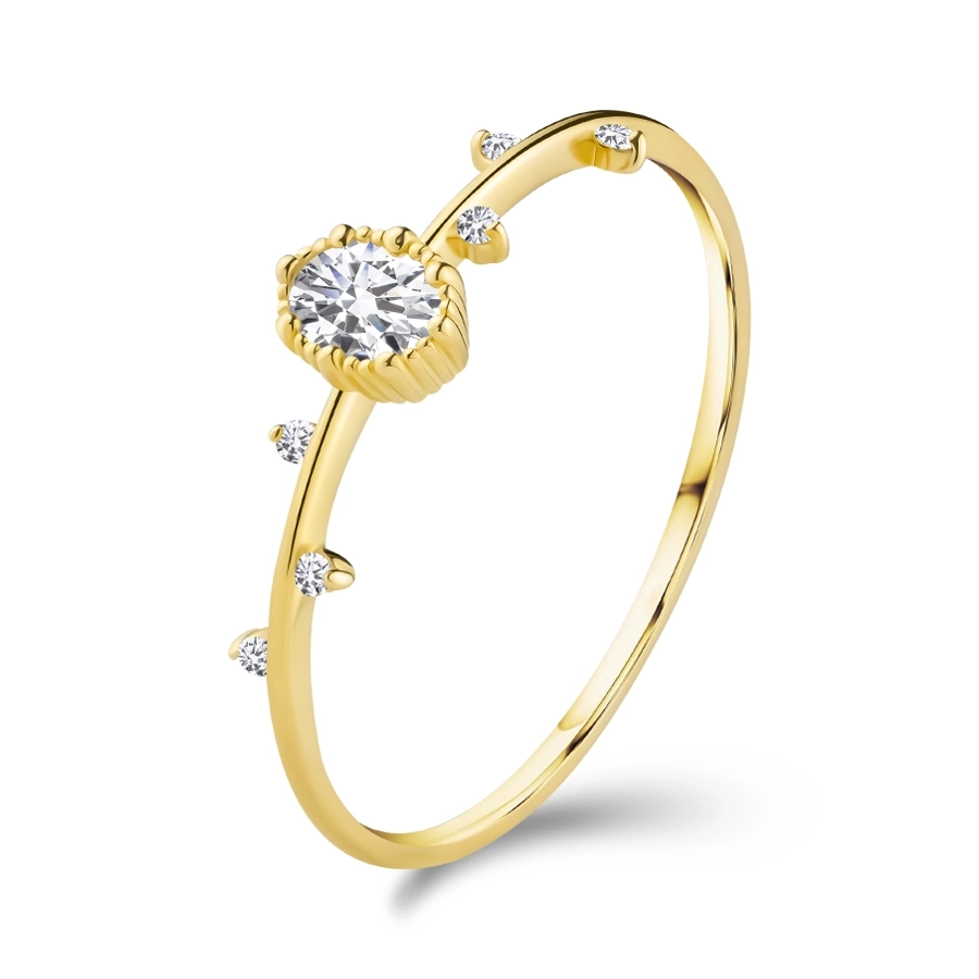 Ring made of yellow 14K gold - clear oval with notched edges, tiny zircons
