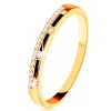 Ring made of yellow 9K gold - strips of black glaze, clear zircon line